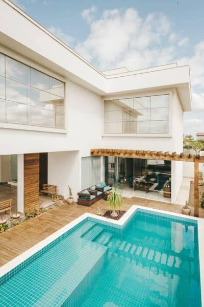 Exterior view of a home with an indoor swimming pool